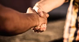 shaking hands showing Commitment in an ACT Therapy Session